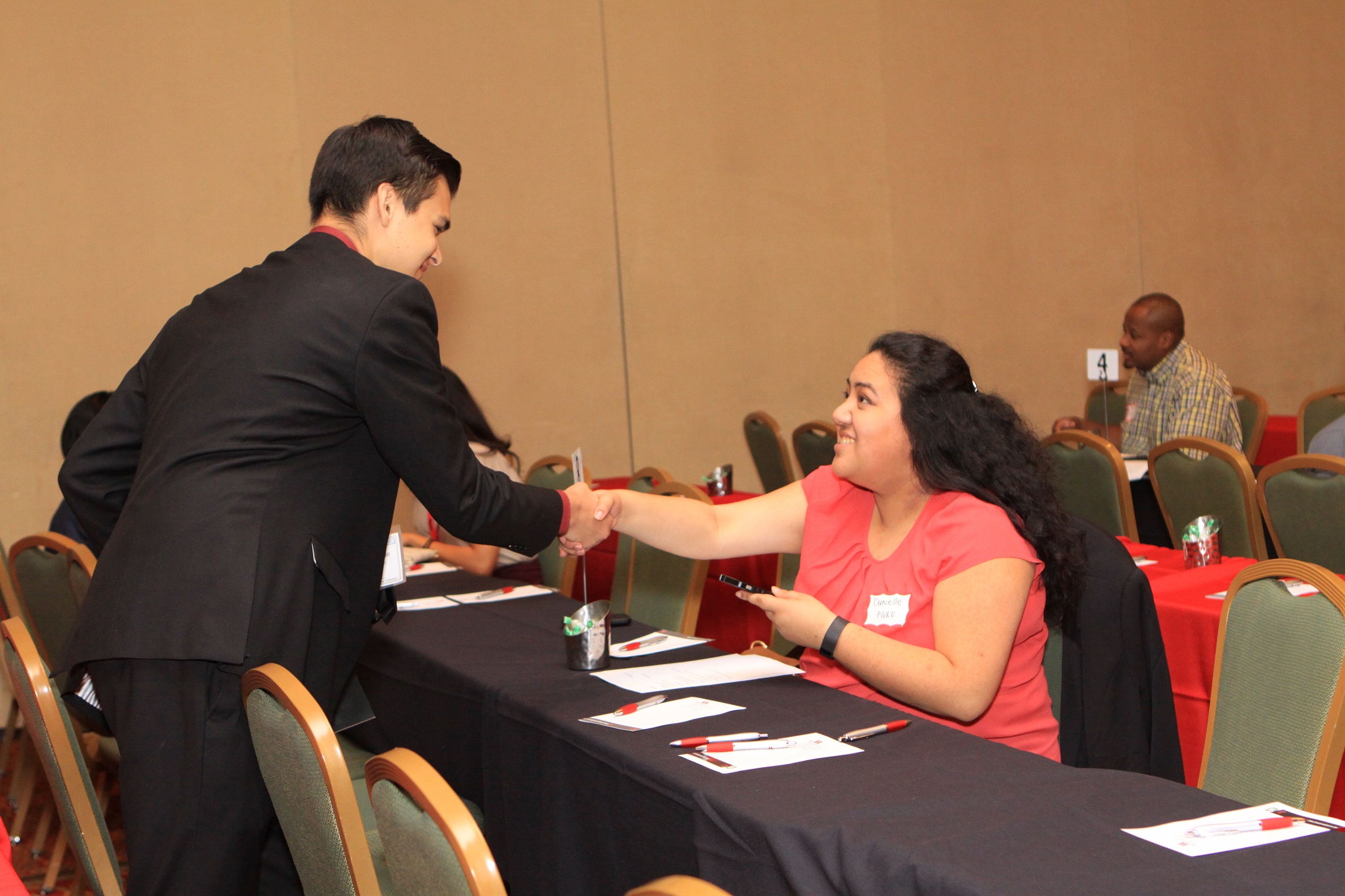 two people shaking hands